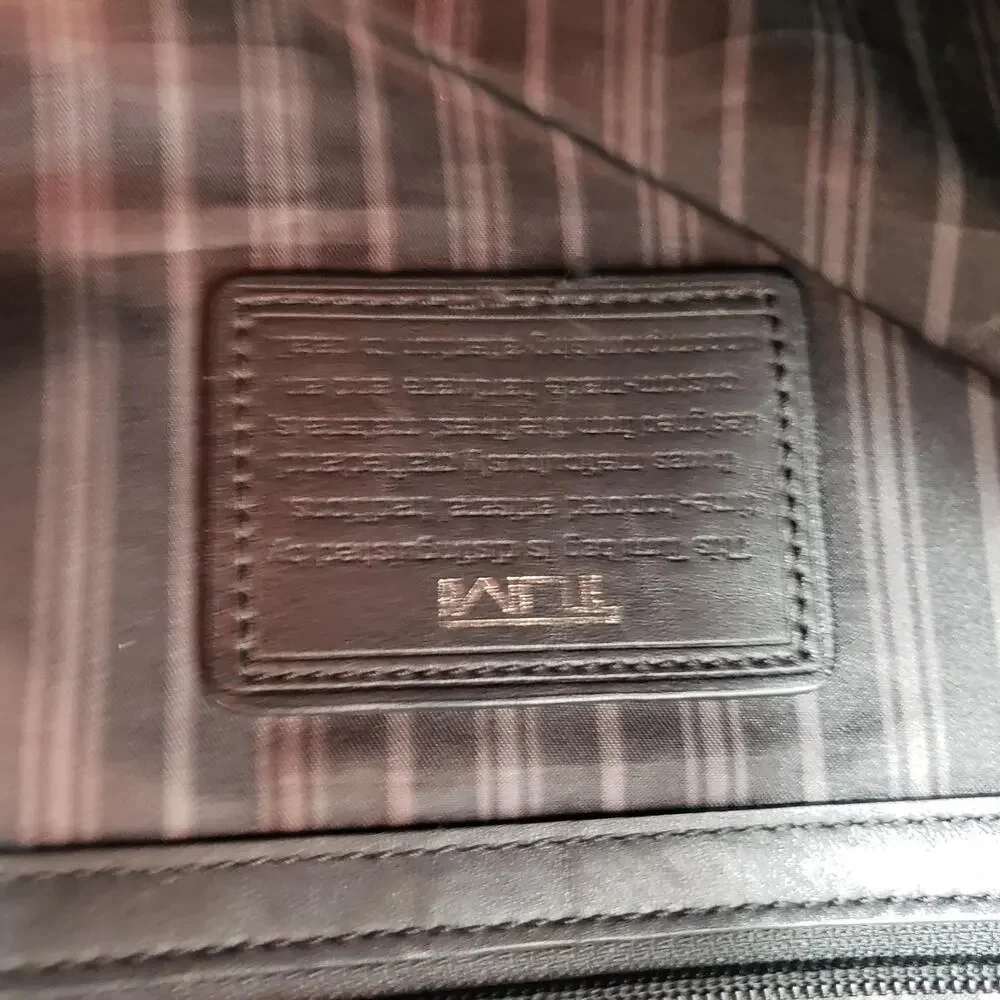 Tumi pebble leather